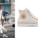 Olivia Palermo con un look general blanco y zapatillas Converse